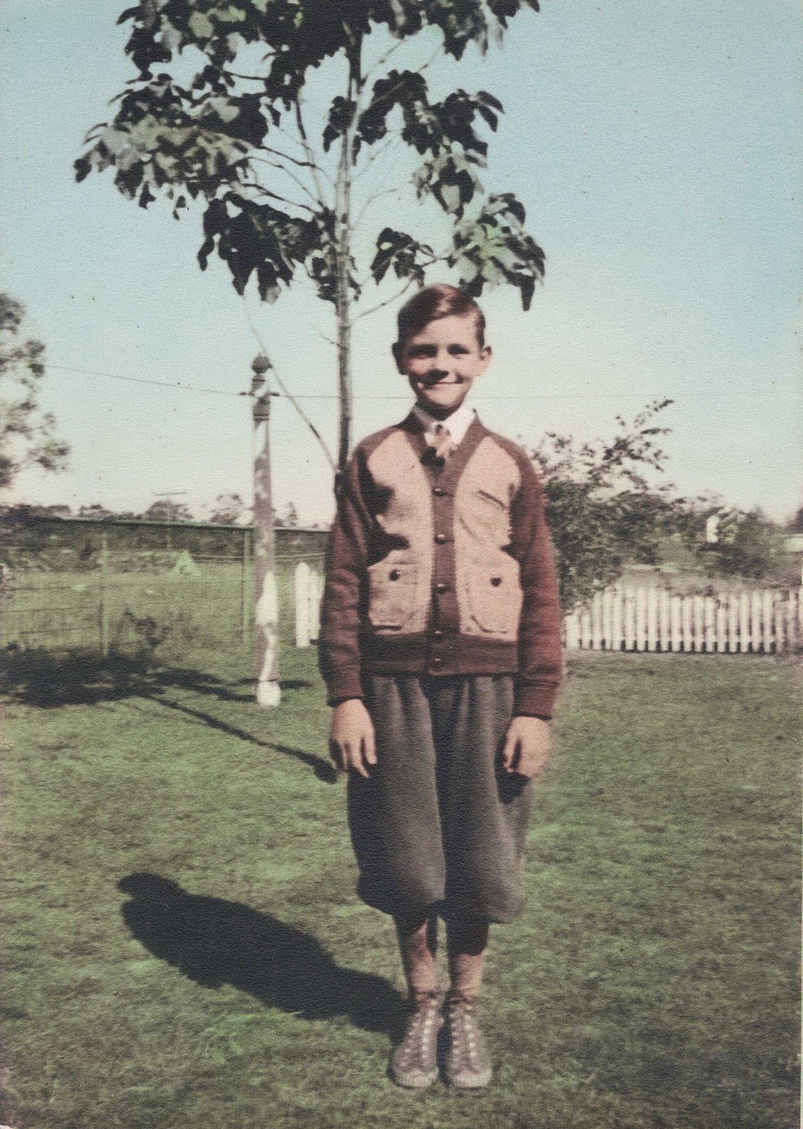 Ernie at about ten, around 1940, in a print Esther later hand-tinted. Ernie at about ten, around 1940, in a print Esther later hand-tinted.